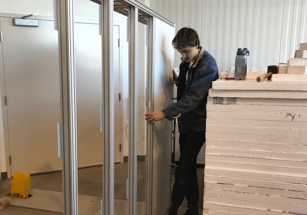 Ben Fischer building the thermal enclosure — all those Lego toys paid off!